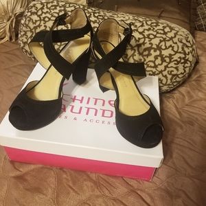 Cross-strapped platform heels